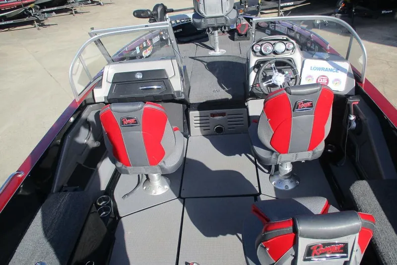 Slide: The Image of 2020 Ranger 620FS Cup-Equipped boat interior with red and gray seating, steering console, and Lowrance electronics. - 8