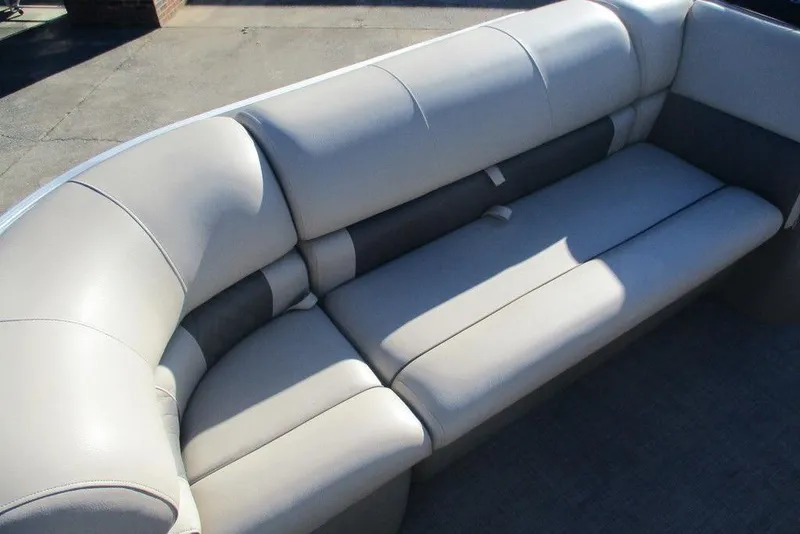 Slide: The Image of 2022 Sun Tracker Party Barge 20 DLX, featuring comfortable beige seating. - 7