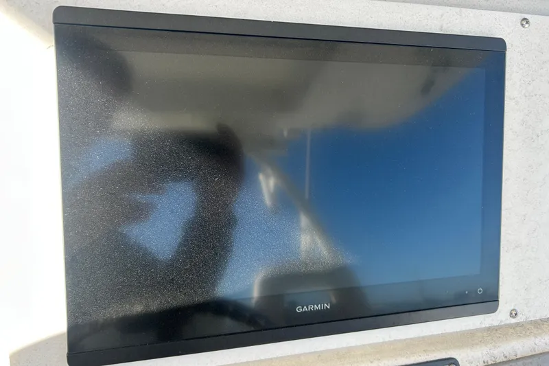 Slide: The Image of Garmin display on 2012 Boston Whaler 370 Outrage boat dashboard. - 14