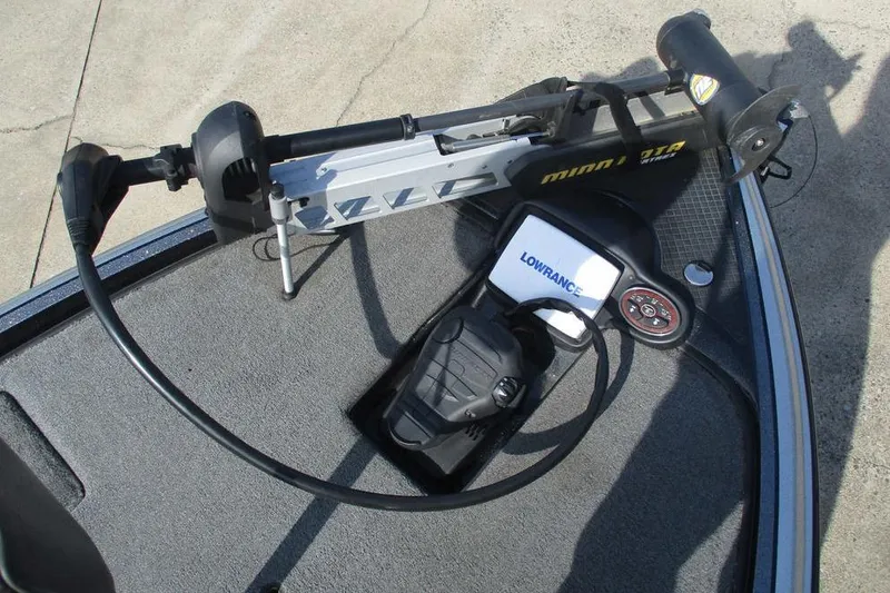 Slide: The Image of 2011 Triton 21XS Elite boat deck with Minn Kota trolling motor and Lowrance electronics. - 9