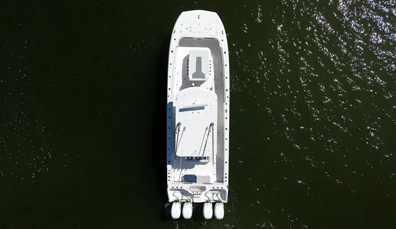 Slide: The Image of Aerial view of 2020 Invincible 37 Catamaran on water. - 12