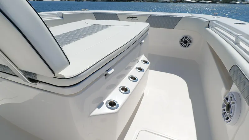 Slide: The Image of Invincible 37 Catamaran 2020 interior with seating and cup holders, ocean view. - 36