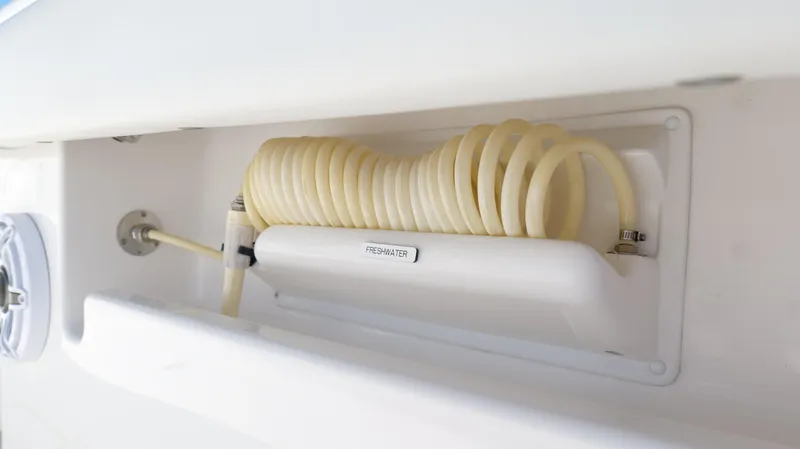 Slide: The Image of Coiled hose storage on 2020 Invincible 37 Catamaran boat. - 41