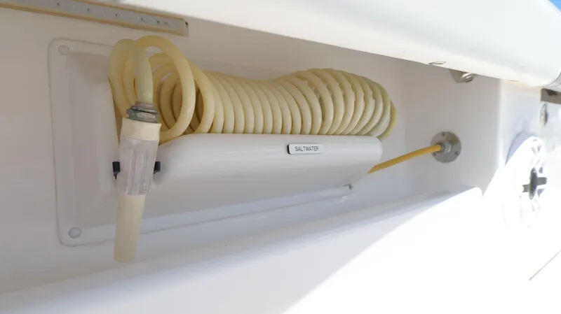 Slide: The Image of Hose storage on Invincible 37 Catamaran, year 2020. - 44