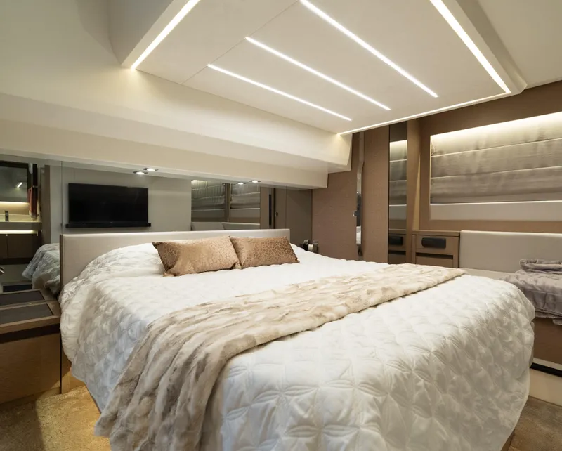 Slide: The Image of Luxurious bedroom interior of 2019 Prestige 520 Flybridge yacht with modern lighting. - 6
