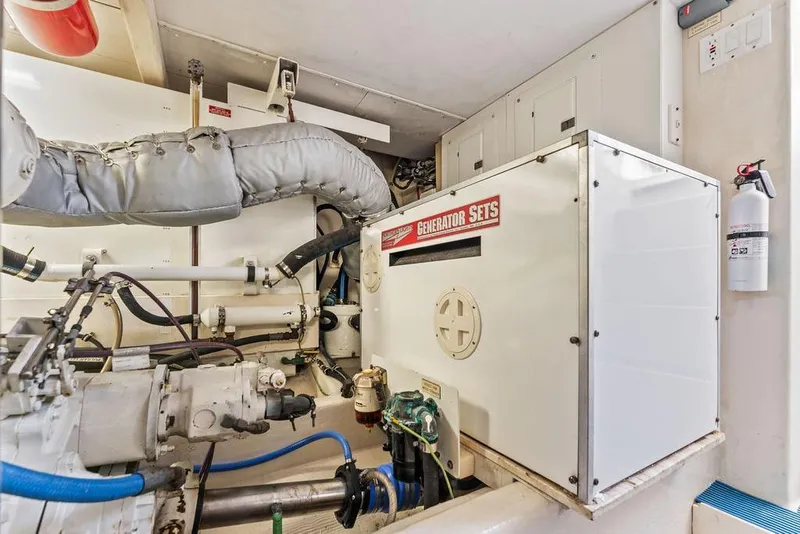 Slide: The Image of Engine room of 2000 West Bay 58 Sonship yacht with generator and equipment. - 31