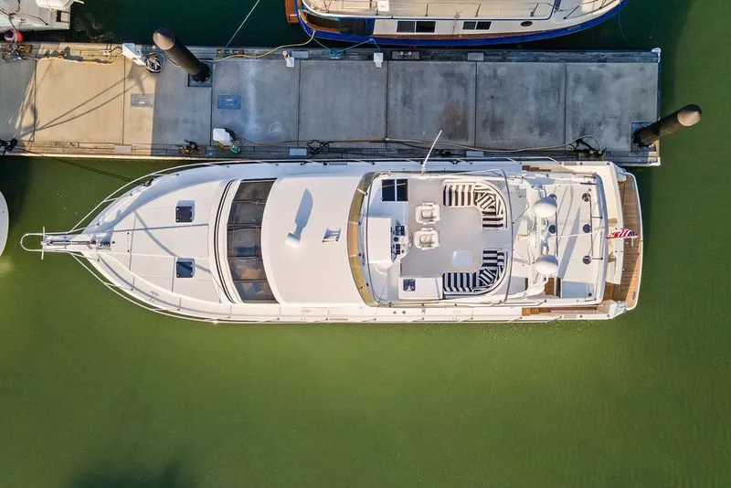 Slide: The Image of Aerial view of 2000 West Bay 58 Sonship yacht docked at marina. - 47