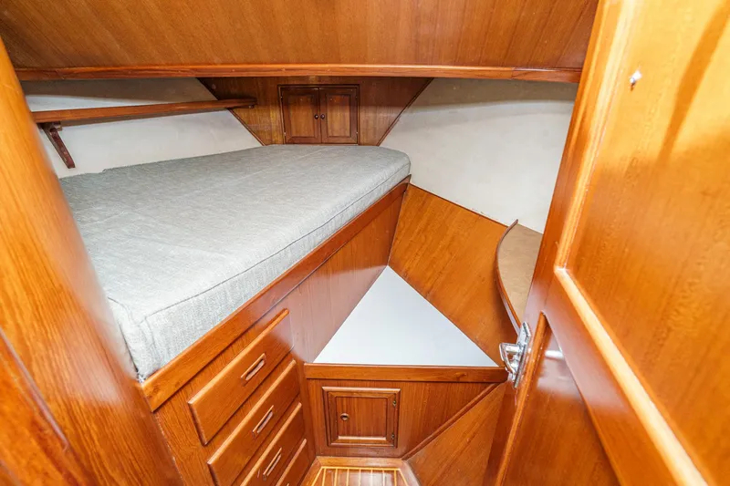 Slide: The Image of Interior of a 1986 Offshore Yachts Cockpit Motoryacht with wood finish. - 26