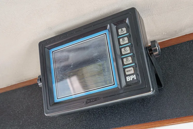 Slide: The Image of Electronic control panel on a 1986 Offshore Yachts Cockpit Motoryacht. - 7