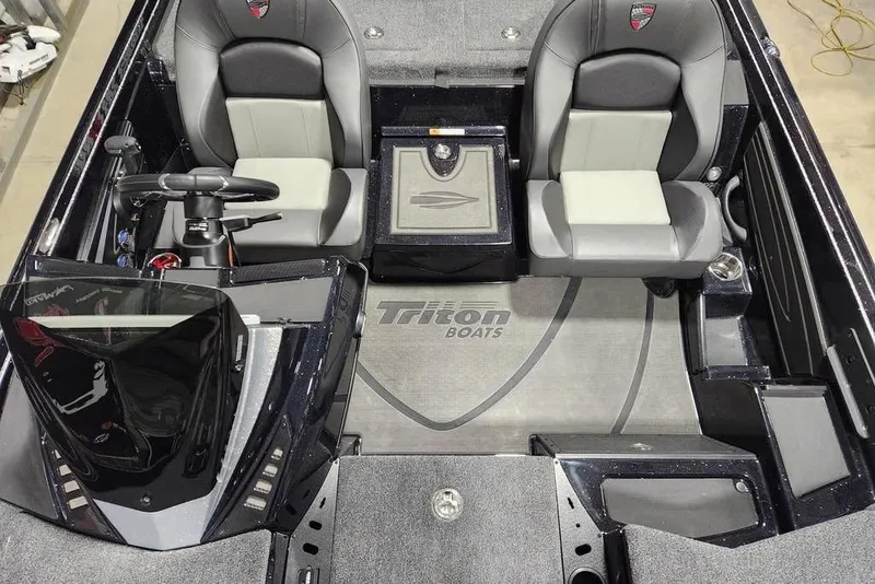 Slide: The Image of 2026 Triton 20XP Patriot boat interior with dual seats and steering console. - 10