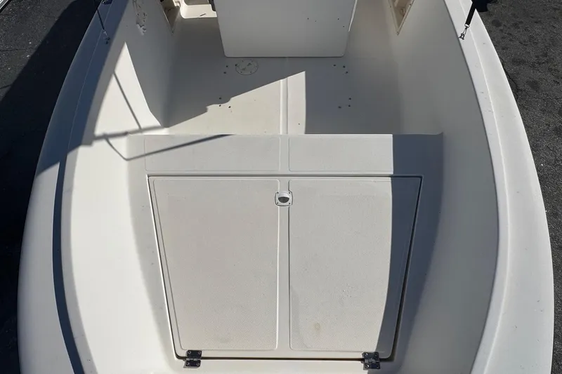 Slide: The Image of 2001 Sea Fox 195 Bay Fisher boat interior with storage compartment. - 14