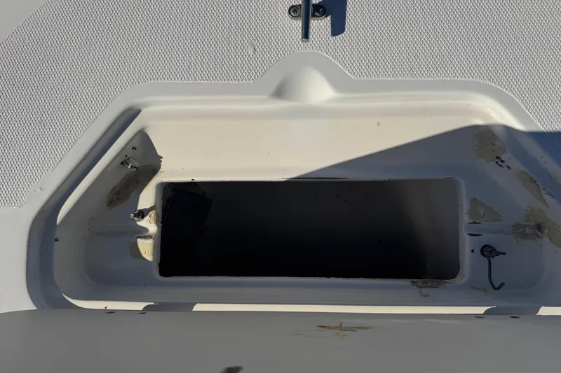 Slide: The Image of Open storage compartment on a 2001 Sea Fox 195 Bay Fisher boat. - 17