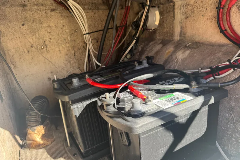 Slide: The Image of Battery compartment of a 2001 Sea Fox 195 Bay Fisher boat with wiring. - 19