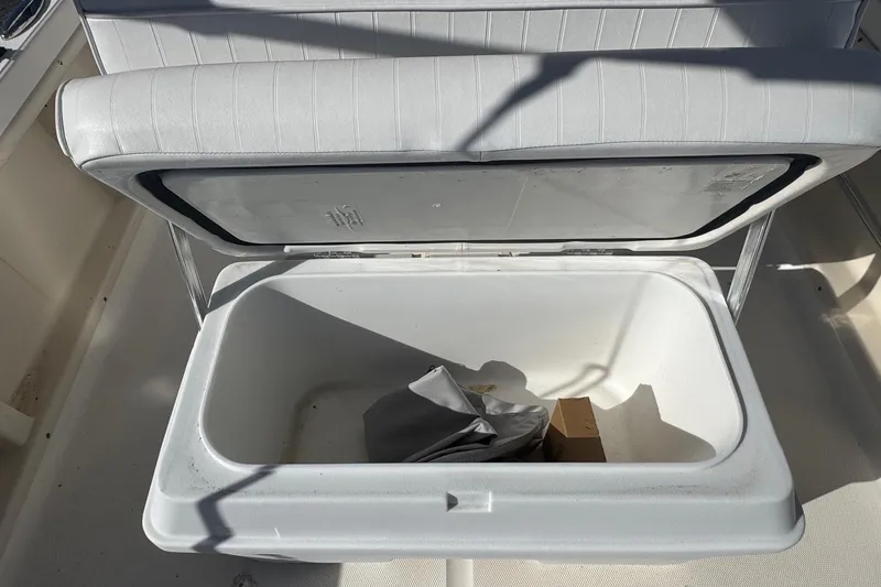 Slide: The Image of Open storage compartment on a 2001 Sea Fox 195 Bay Fisher boat. - 24