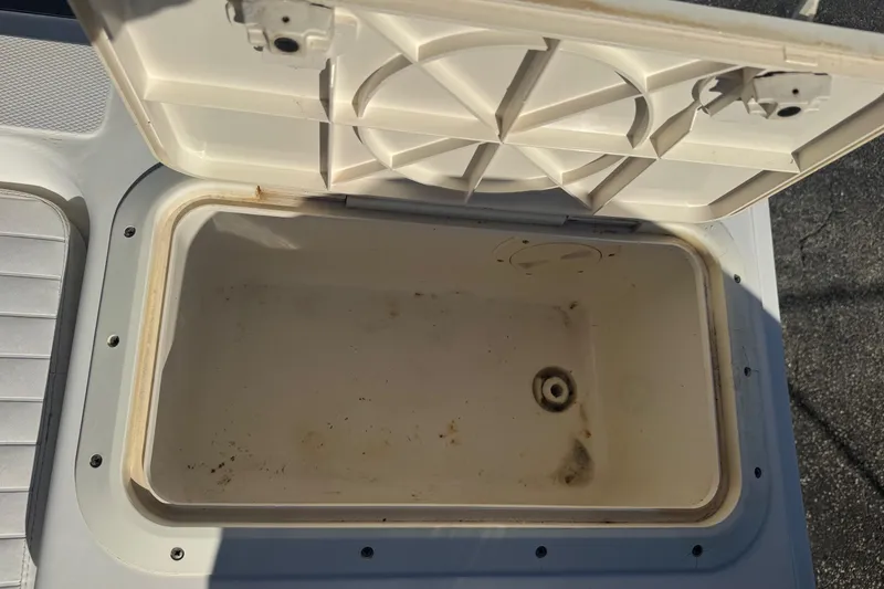 Slide: The Image of Open storage compartment on a 2001 Sea Fox 195 Bay Fisher boat. - 26