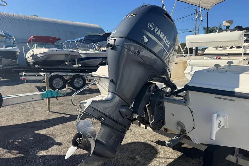 Slide: The Image of 2001 Sea Fox 195 Bay Fisher with Yamaha outboard motor in a boatyard. - 30