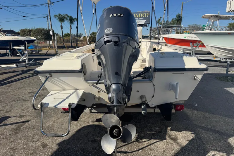 Slide: The Image of Rear view of a 2001 Sea Fox 195 Bay Fisher boat with outboard motor. - 31