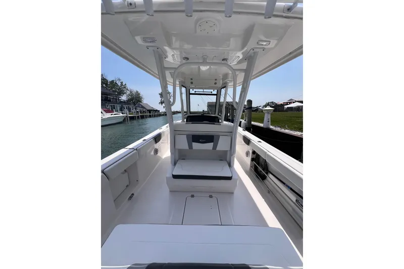 Slide: The Image of 2022 Robalo R272 Center Console interior with blue LED lighting. - 12