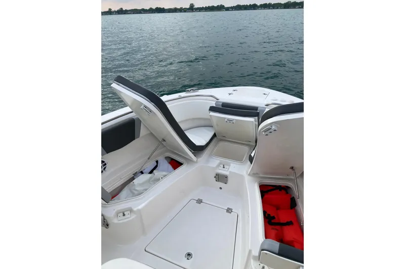 Slide: The Image of Simrad display on 2022 Robalo R272 Center Console showing engine metrics and navigation data. - 18