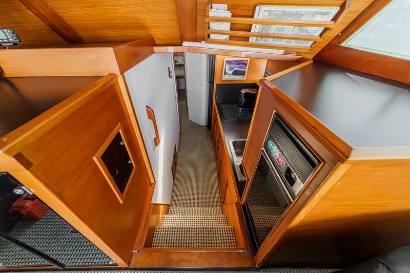 Slide: The Image of 1974 Pacemaker Sportfisher yacht interior with wood finish. - 10