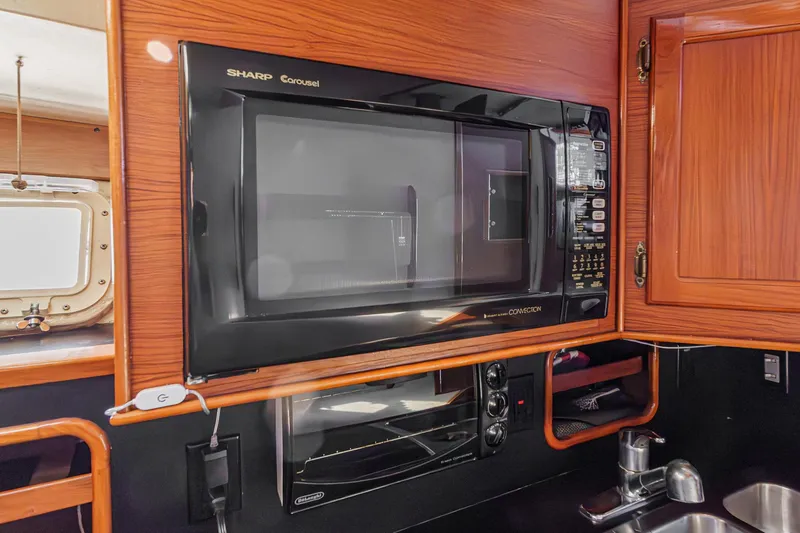 Slide: The Image of Galley area on a 1974 Pacemaker Sportfisher boat. - 17