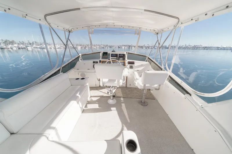 Slide: The Image of Interior of a 1974 Pacemaker Sportfisher yacht with white seating. - 22