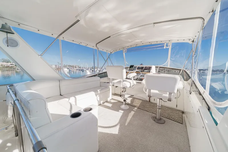 Slide: The Image of Interior of a 1974 Pacemaker Sportfisher yacht with white seating. - 23
