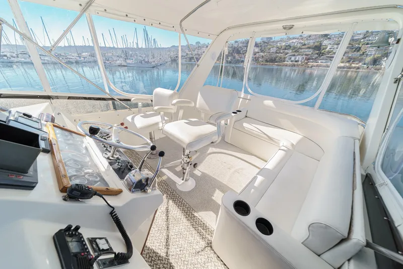 Slide: The Image of Interior of a 1974 Pacemaker Sportfisher yacht with white seating. - 24