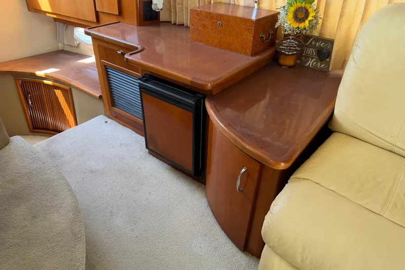 Slide: The Image of Interior of 2003 Carver 360 Sport Sedan with wooden cabinetry and stairs. - 19