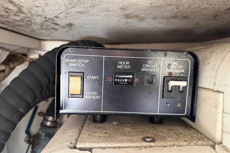 Slide: The Image of 2003 Carver 360 Sport Sedan boat deck with anchor and railing. - 36