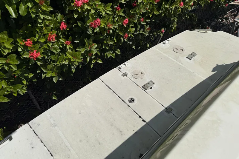 Slide: The Image of 2003 Carver 360 Sport Sedan helm with Raymarine electronics and steering wheel. - 6