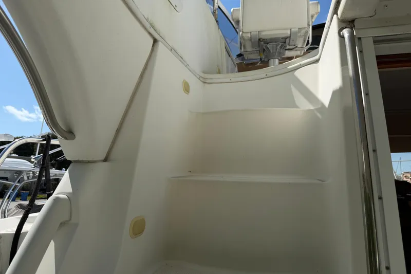 Slide: The Image of 2003 Carver 360 Sport Sedan dashboard with Raymarine navigation system. - 8