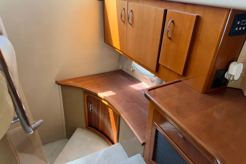 Slide: The Image of Interior of 2003 Carver 360 Sport Sedan with wooden door and carpeted floor. - 20