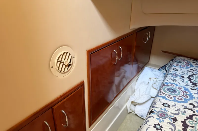 Slide: The Image of Cozy bed with floral bedding in 2003 Carver 360 Sport Sedan cabin. - 23