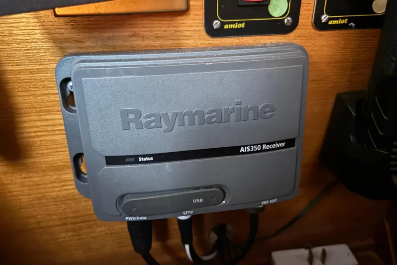 Slide: The Image of Raymarine AIS350 receiver installed on 1986 Beneteau First 375 yacht interior. - 12
