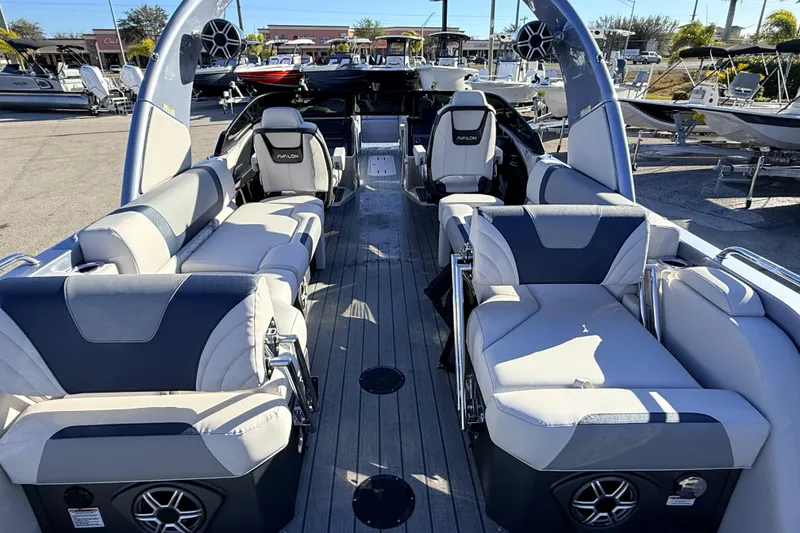Slide: The Image of 2026 Avalon Excalibur boat interior with luxurious seating and modern design. - 11