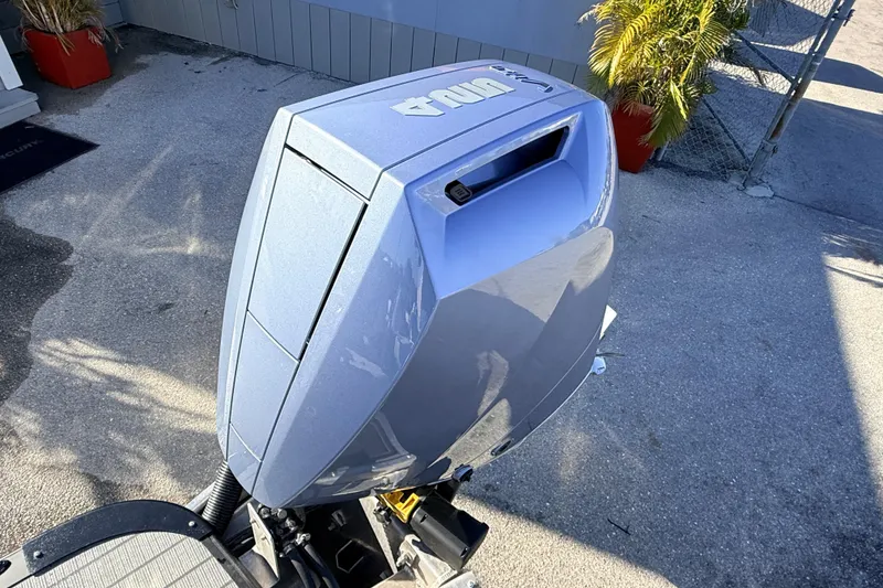 Slide: The Image of 2026 Avalon Excalibur boat engine, featuring twin Mercury 425hp V-10s with joystick control. - 13