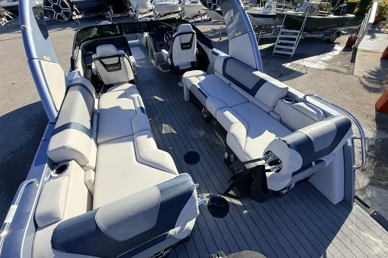 Slide: The Image of 2026 Avalon Excalibur boat interior with luxurious seating and modern design. - 15