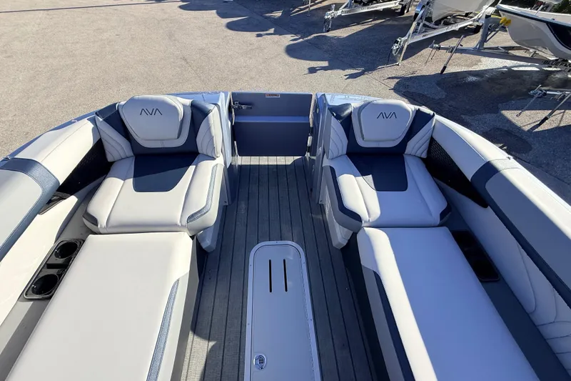 Slide: The Image of Luxurious 2026 Avalon Excalibur boat interior with quad loungers and sleek design. - 22