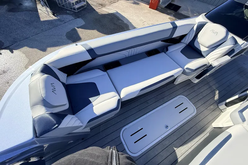 Slide: The Image of 2026 Avalon Excalibur boat interior with luxurious seating and modern design. - 23