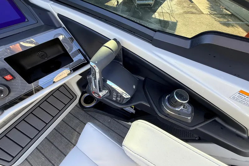 Slide: The Image of Control panel of 2026 Avalon Excalibur boat with joystick and throttle. - 32