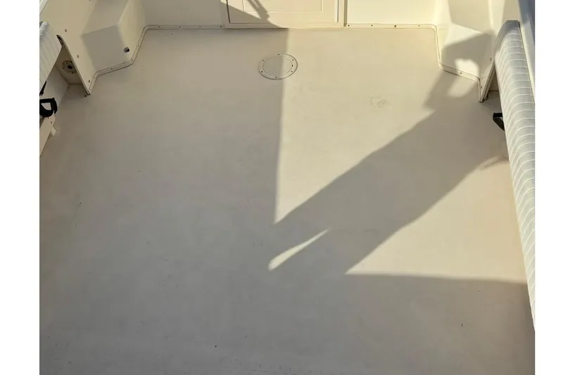 Slide: The Image of Spacious deck of 2008 Parker 2320 SL Sport Cabin boat, featuring clean, open layout. - 11