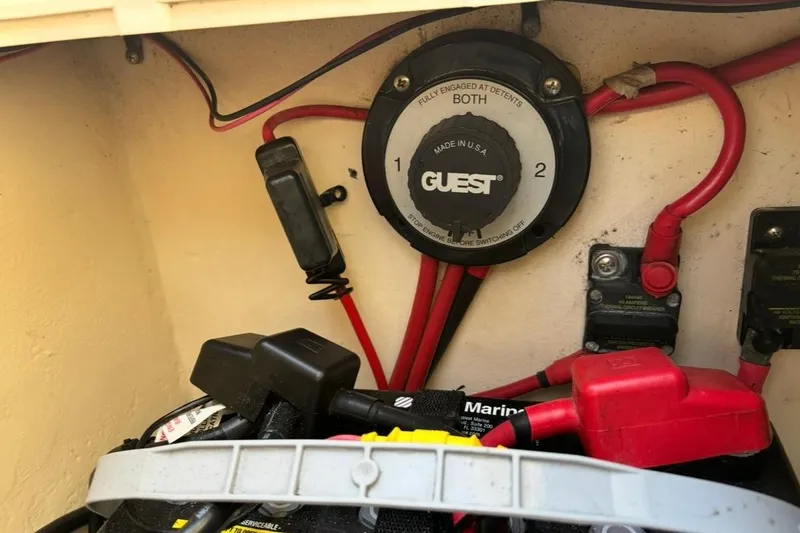 Slide: The Image of Battery switch and wiring inside a 2008 Parker 2320 SL Sport Cabin boat. - 19