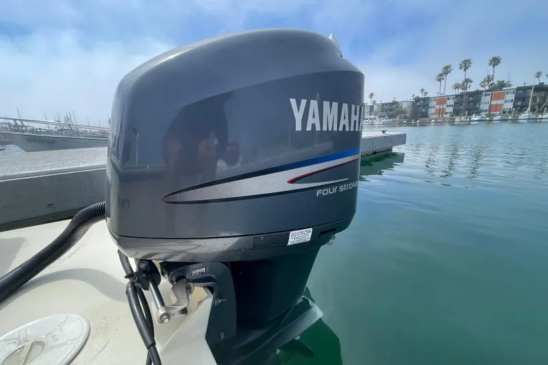 Slide: The Image of Yamaha four-stroke outboard motor on a 2008 Parker 2320 SL Sport Cabin boat. - 24