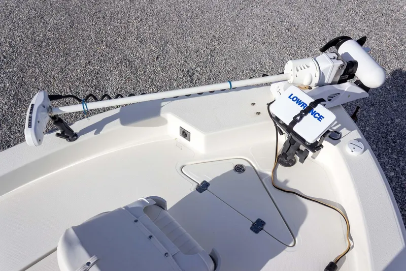 Slide: The Image of 2014 NauticStar 2400 Sport boat with Lowrance equipment on deck. - 17