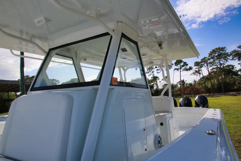 Slide: The Image of 2022 Yellowfin 39 Offshore boat with sleek design and powerful engines. - 13