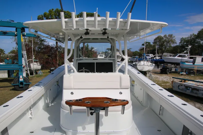 Slide: The Image of 2022 Yellowfin 39 Offshore boat with spacious deck and fishing rod holders. - 17