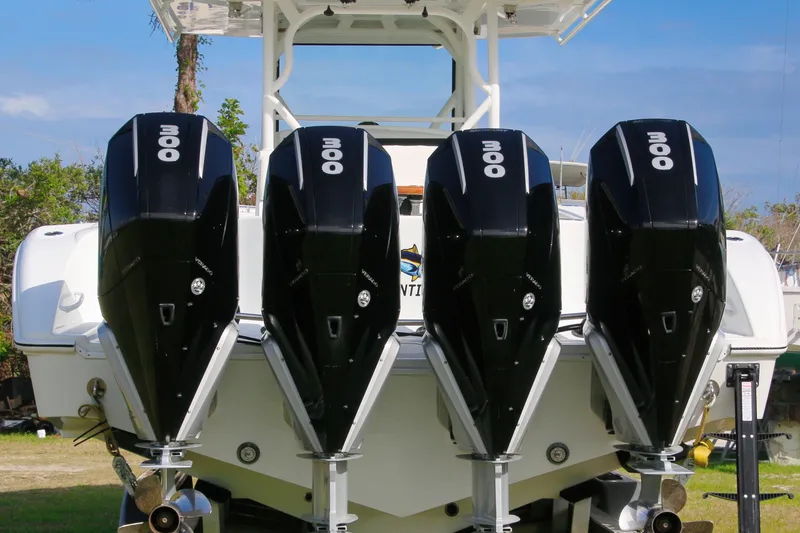 Slide: The Image of 2022 Yellowfin 39 Offshore boat with four powerful outboard engines. - 29