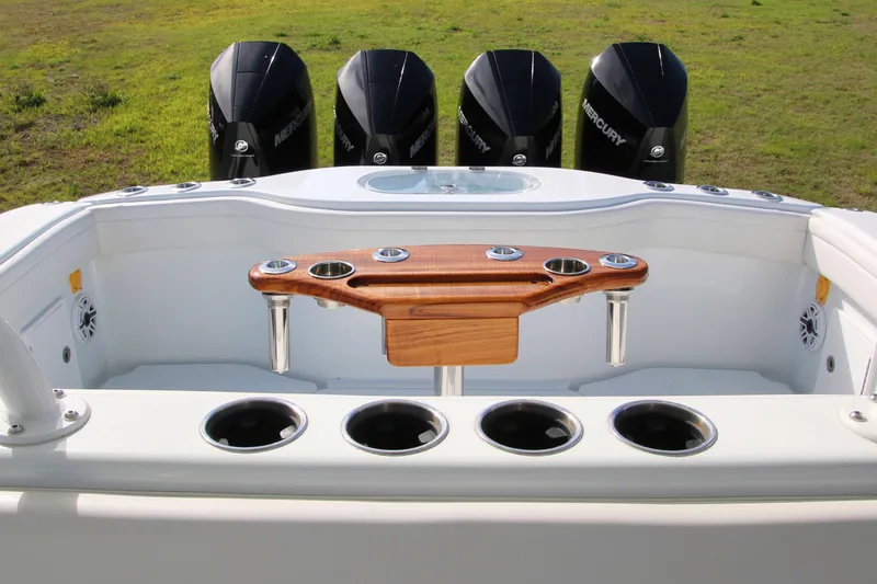 Slide: The Image of 2022 Yellowfin 39 Offshore boat with Mercury engines and wooden rod holder. - 34