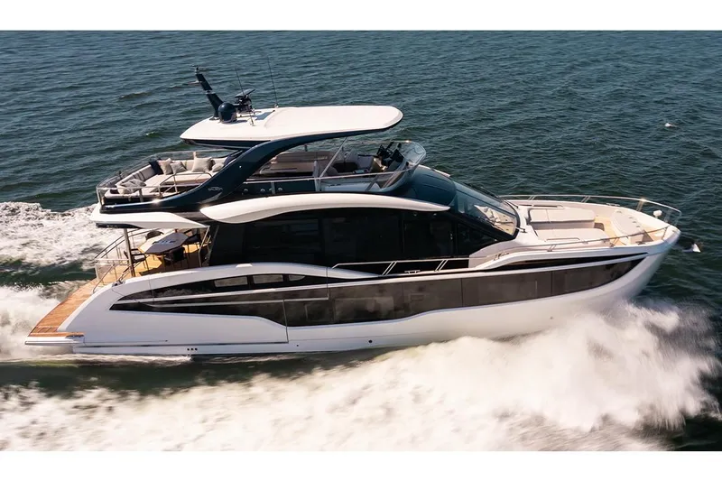 Slide: The Image of Manufacturer Provided Image: 2025 Galeon 620 FLY yacht cruising on open water, showcasing sleek design and luxury features. - 0